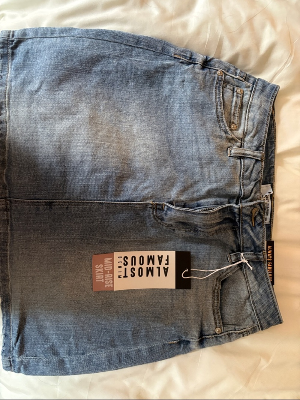 Almost Famous Light Blue Denim Mini Skirt with Front Pockets